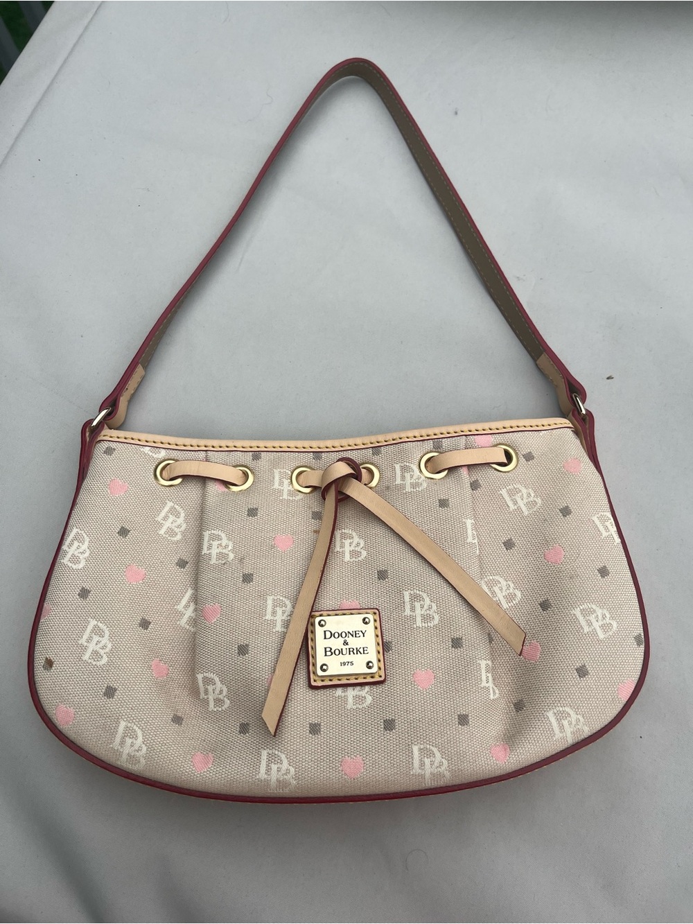 Dooney & Bourke Beige Canvas Shoulder Bag with Pink Accents